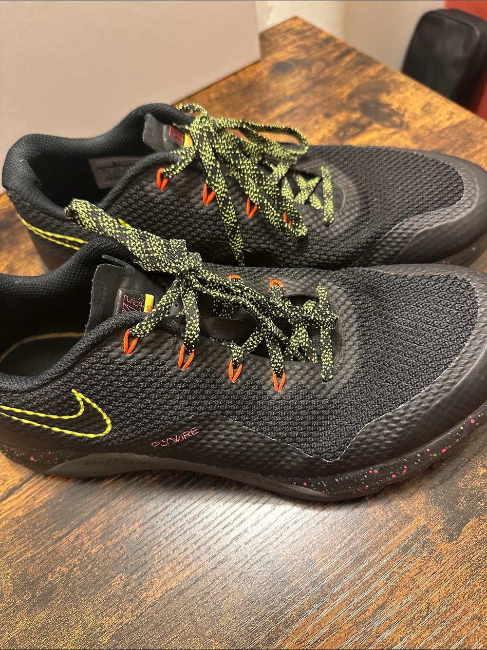 Nike Men’s Black Metcon Shoes with Neon Yellow Accents